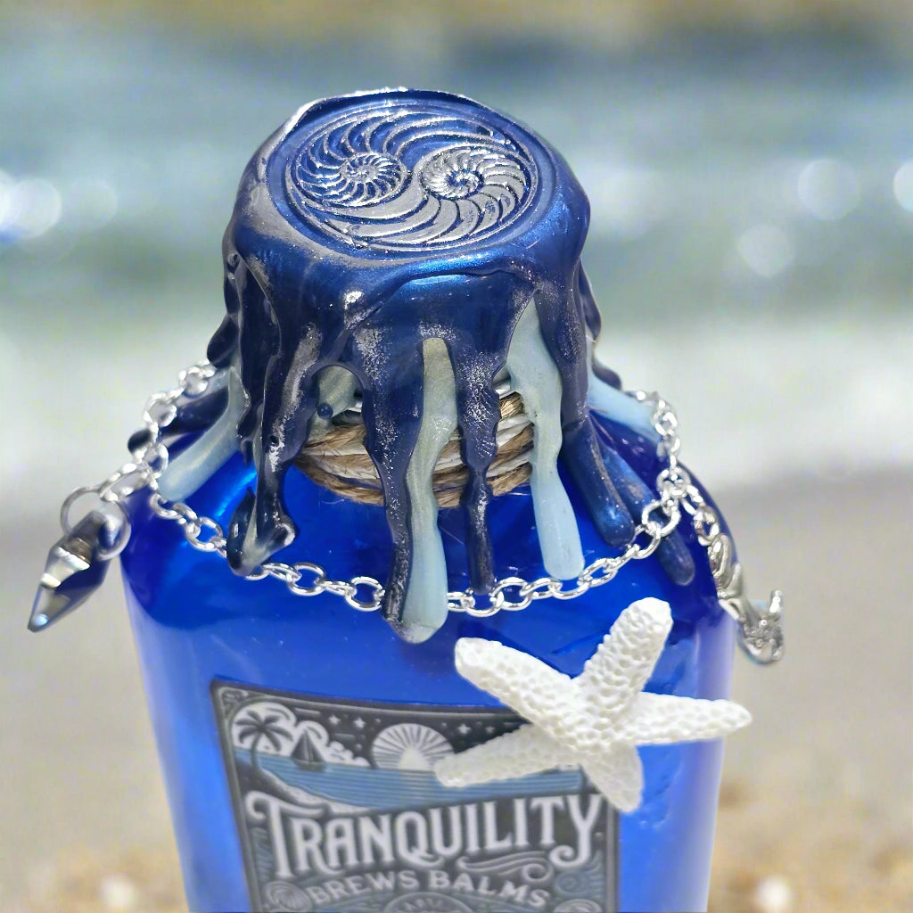 Tranquility Brews Balms Glass Potion Bottle Prop - Decorative Gift with Color Changing Liquid & Starfish Accents 5 Inches Tall