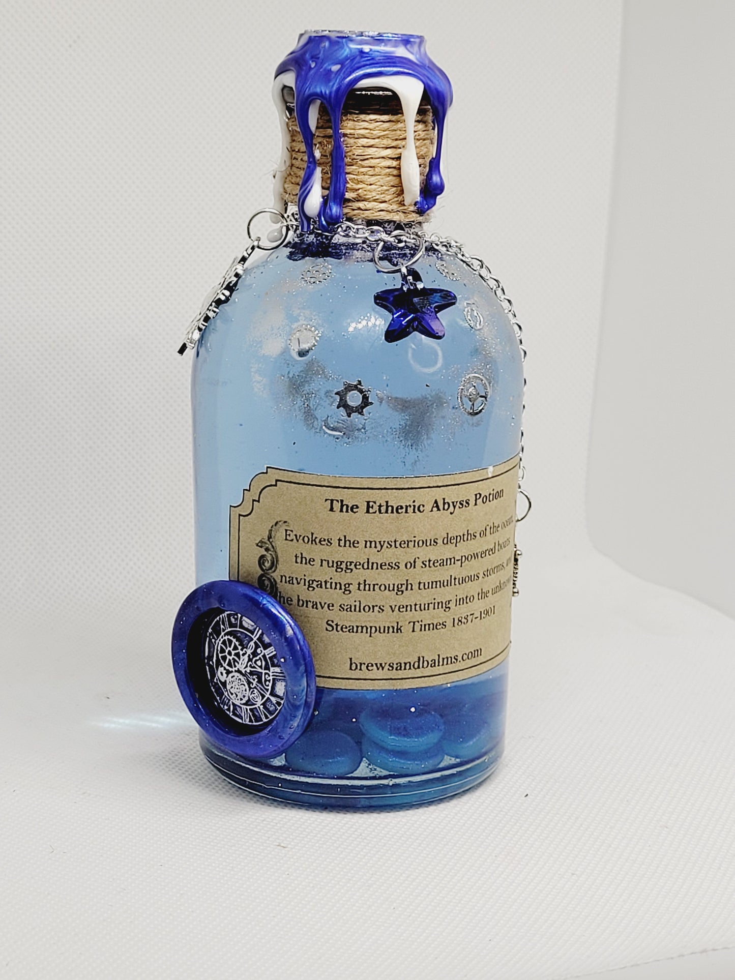 The Etheric Abyss Brew Elixir Potion Silver and Blue Decorative Bottle