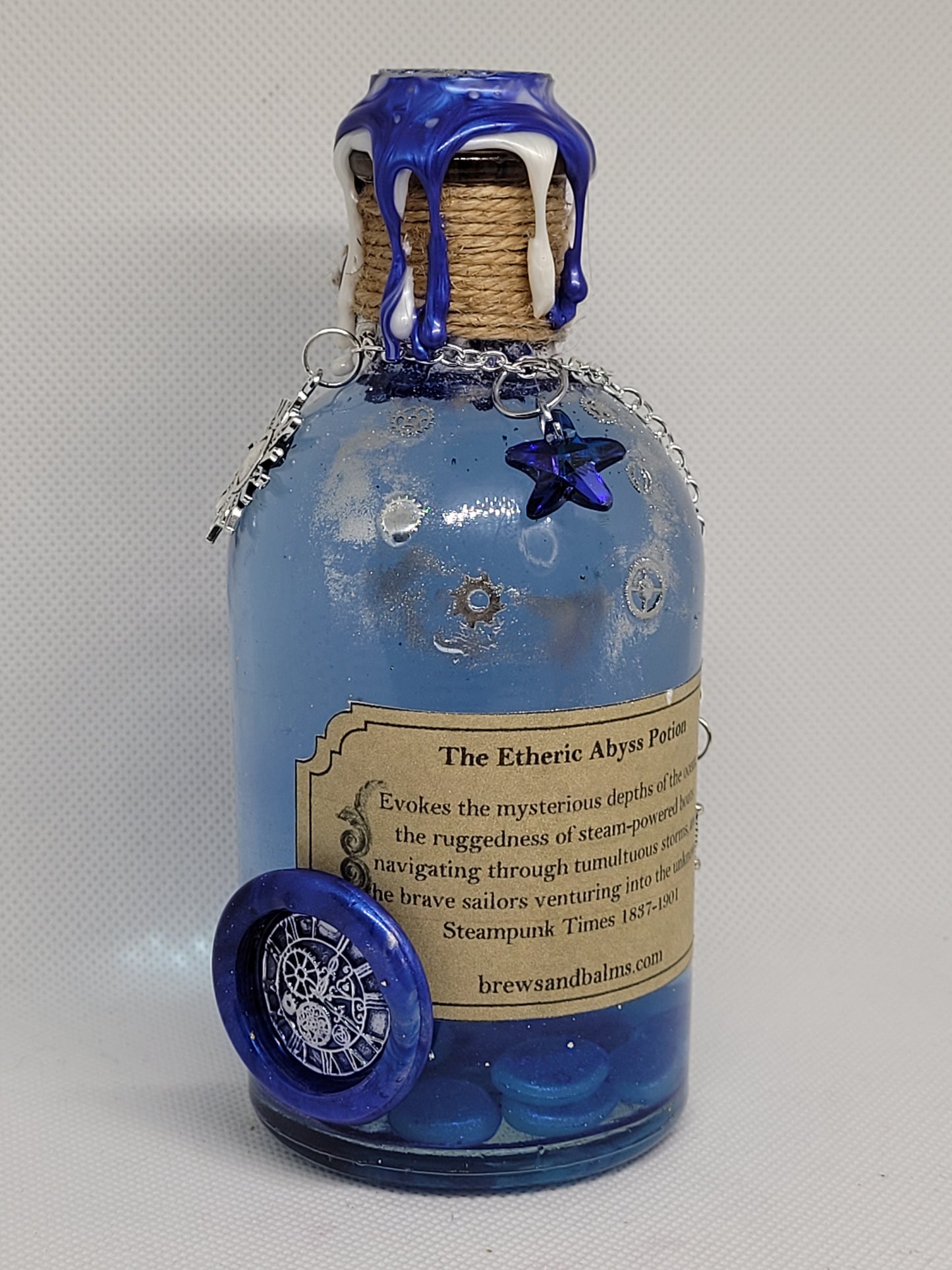 The Etheric Abyss Brew Elixir Potion Silver and Blue Decorative Bottle