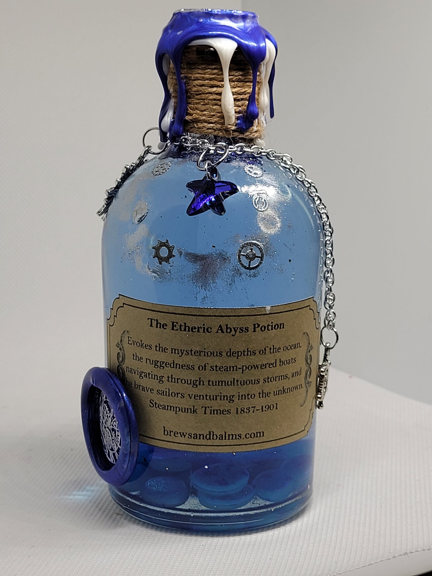 The Etheric Abyss Brew Elixir Potion Silver and Blue Decorative Bottle