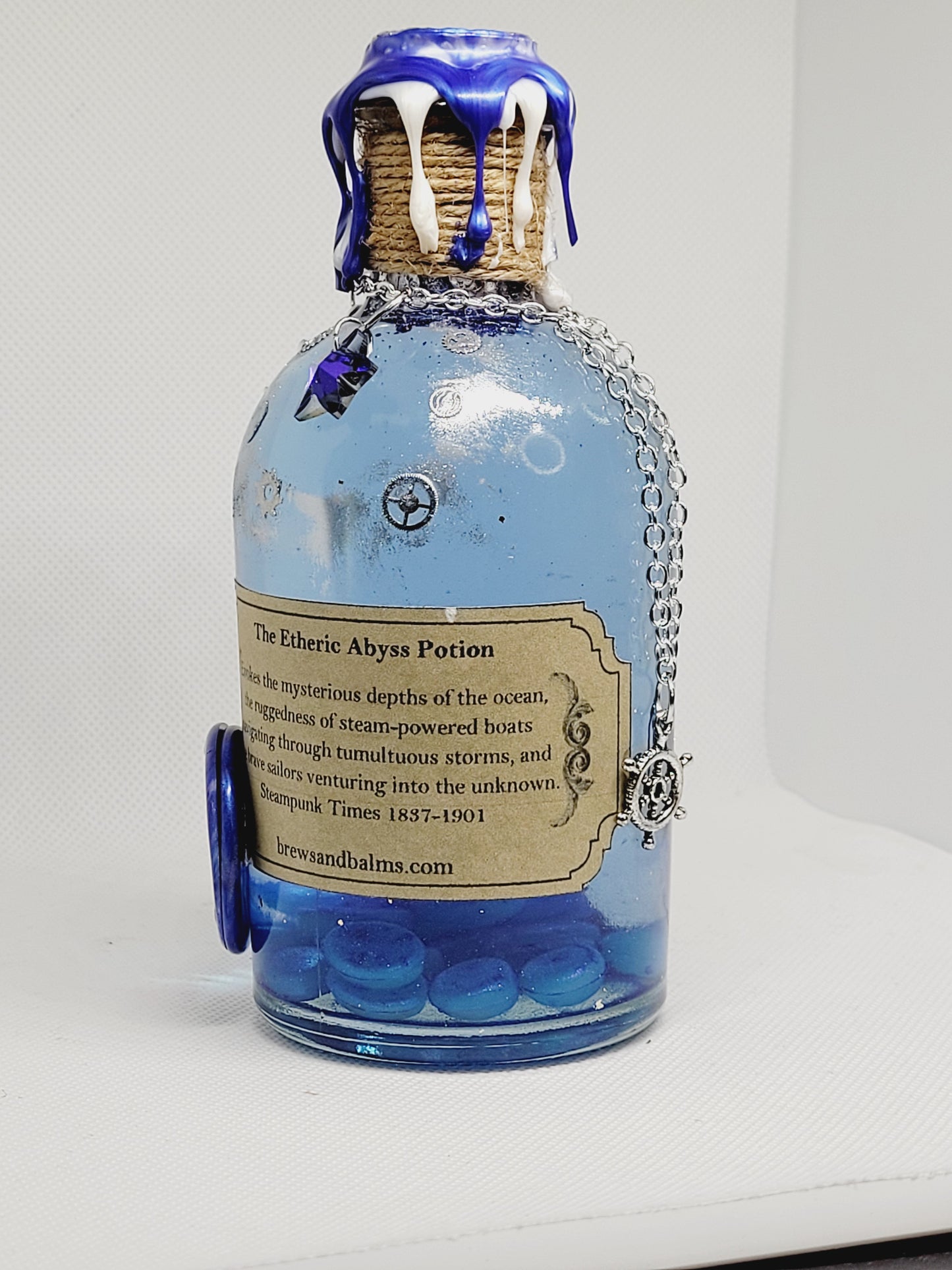 The Etheric Abyss Brew Elixir Potion Silver and Blue Decorative Bottle