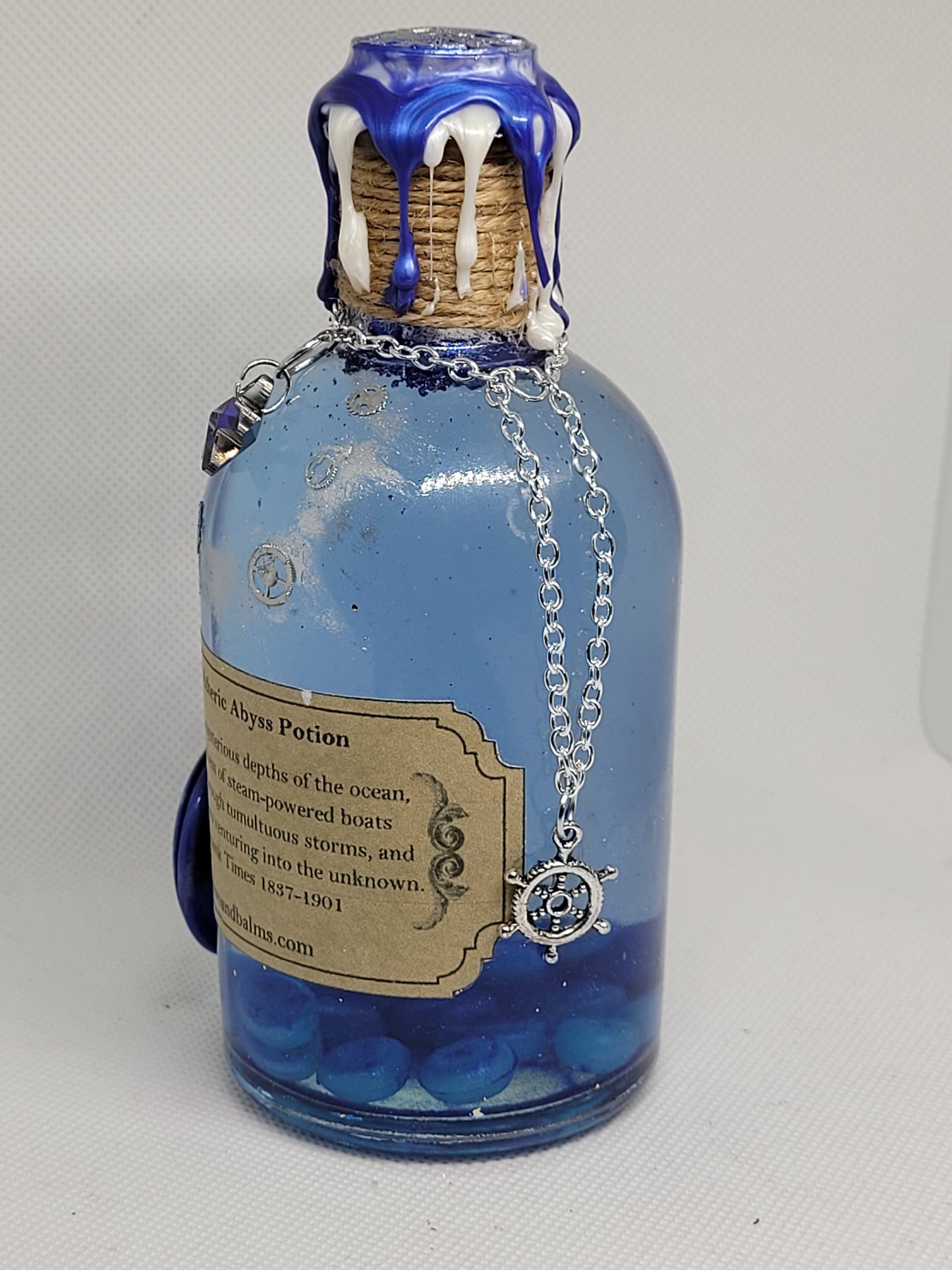 The Etheric Abyss Brew Elixir Potion Silver and Blue Decorative Bottle