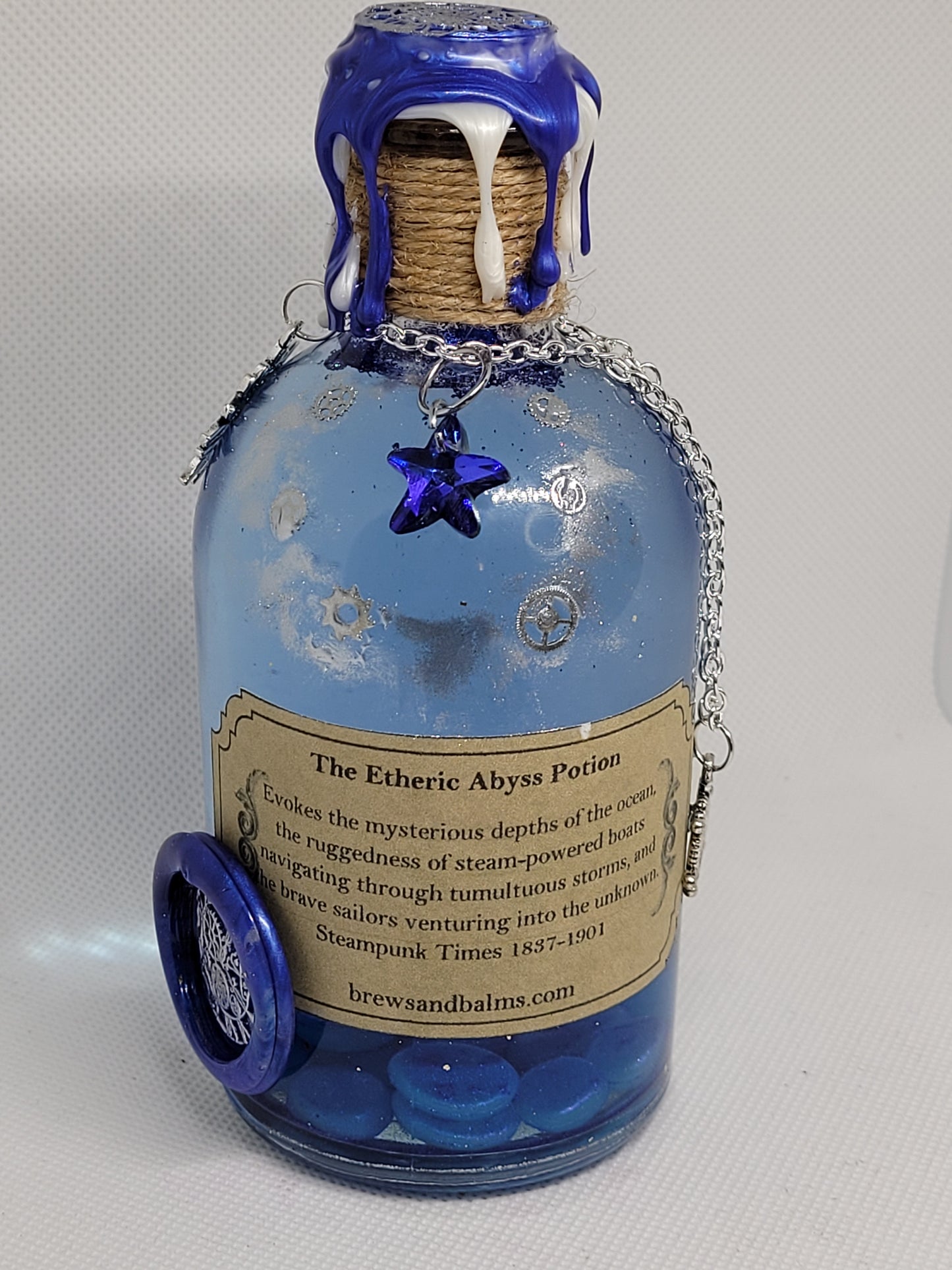 The Etheric Abyss Brew Elixir Potion Silver and Blue Decorative Bottle